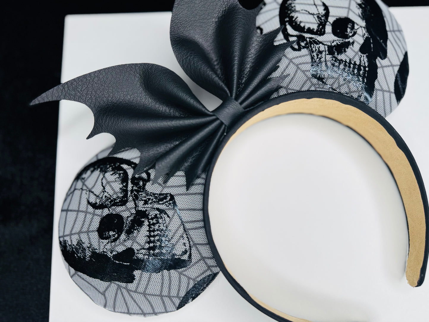 Skull with webs mouse ears