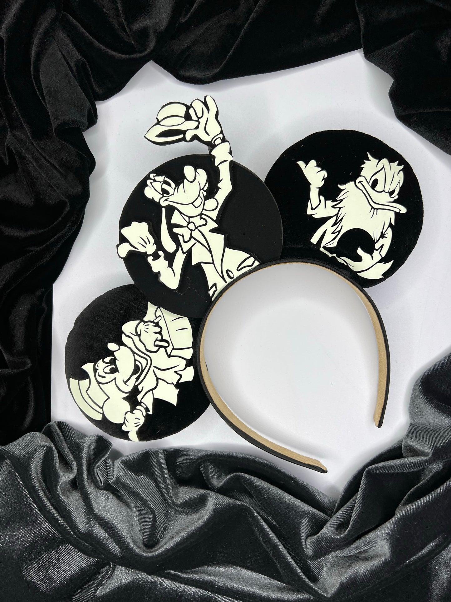 Hitchhiking ghost Mickey, Goofy and Donald inspired ears